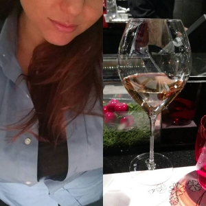 Vegas Massage Escort Rates of Xena. A top rated pampering experience. Close up of Xena and wine glass at a high end dinner in Vegas.
